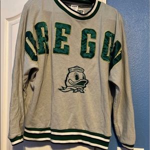 Unique PINK Oregon University sweatshirt that is a size :Medium